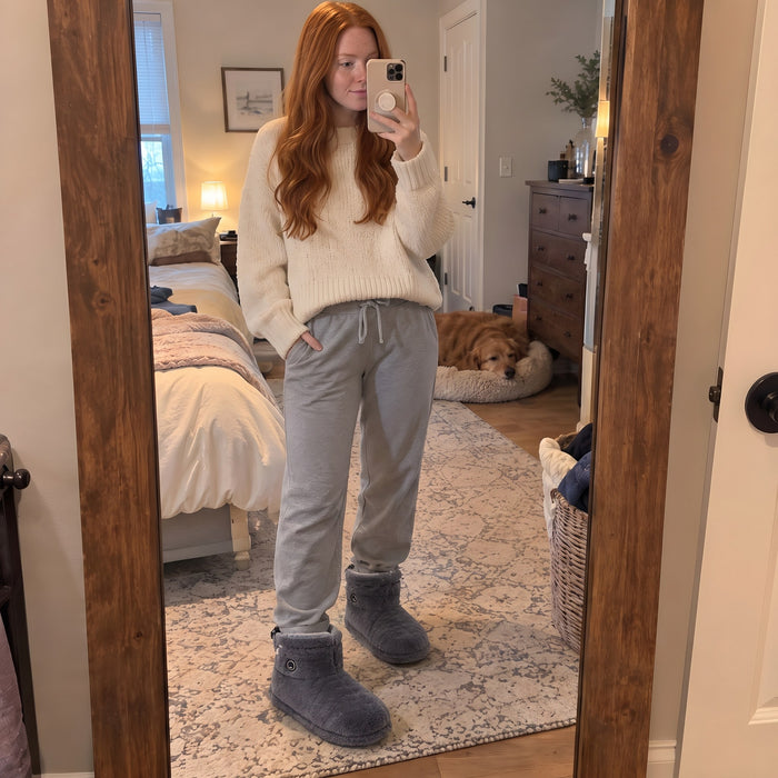 Customer mirror selfie wearing La Nocte heated slipper boots