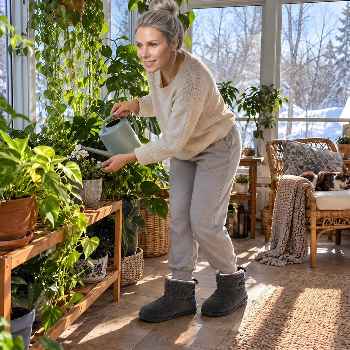 Watering plants at home in La Nocte heated slipper boots
