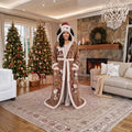 La Nocte heated robe, Christmas Snoopy style, worn by the Christmas tree